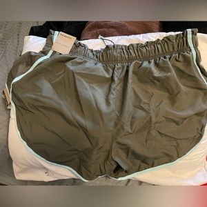 Olive green with aqua blue trimming.